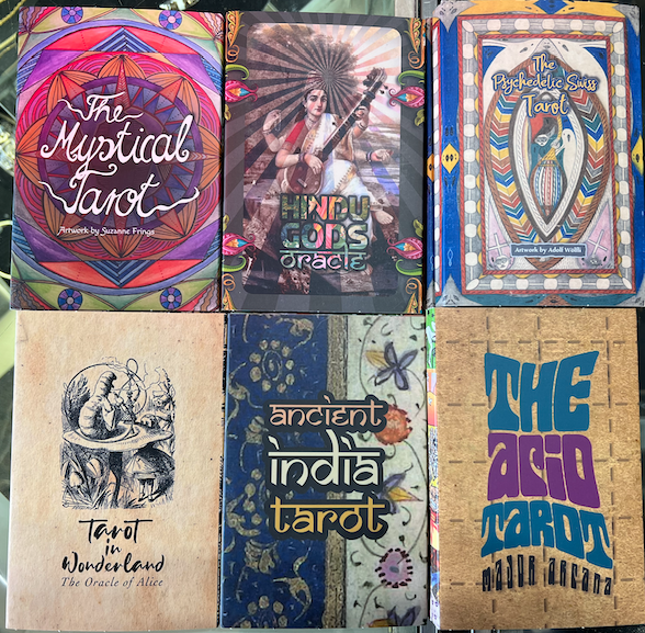 6 tarot card decks (Mystical, Hindu Gods Oracle, Psychedelic Swiss, Alice In Wonderland, Ancient India, Acid Tarot Major Arcana)